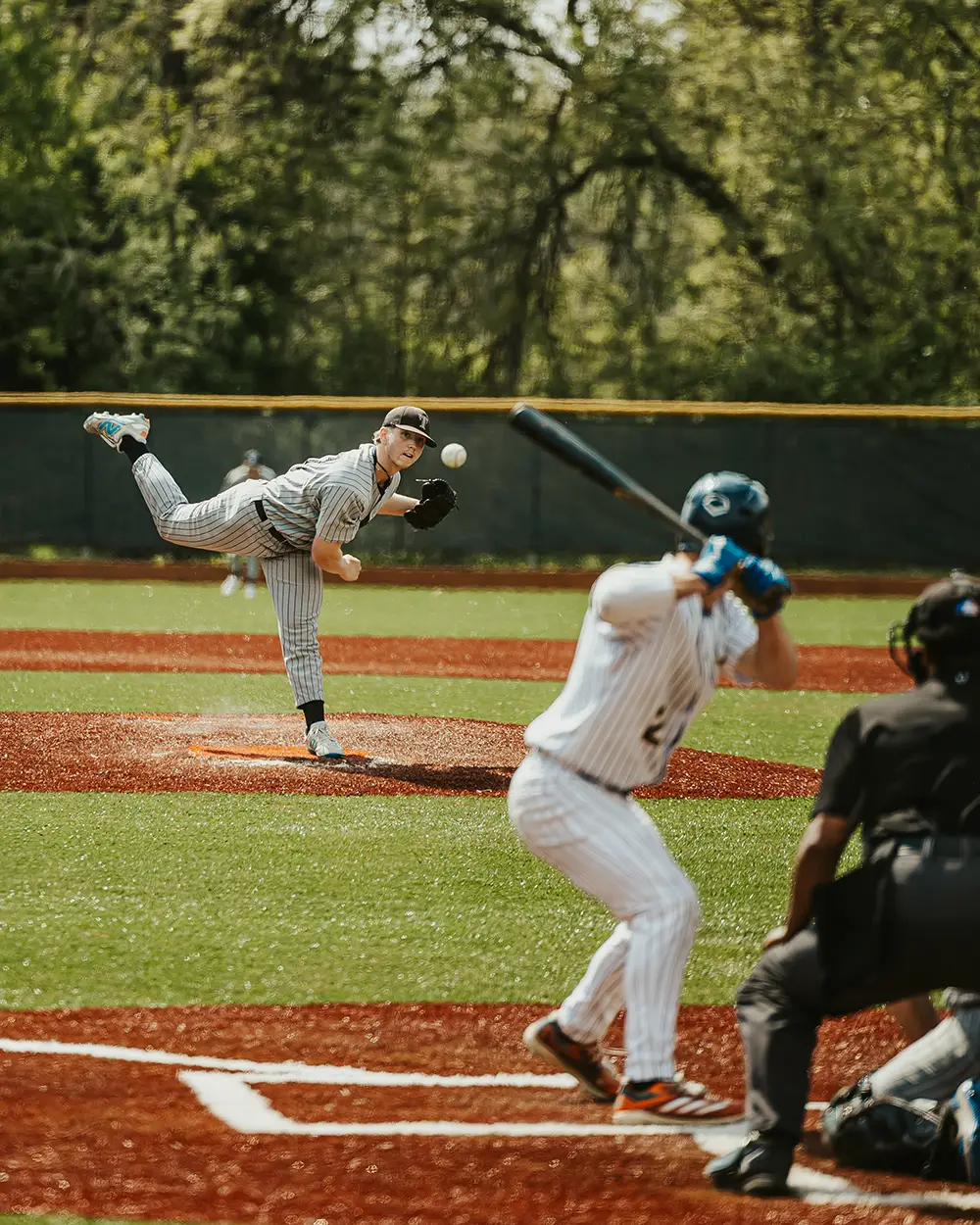Sam Wilson in his follow-through, the pitch already on its way to the plate