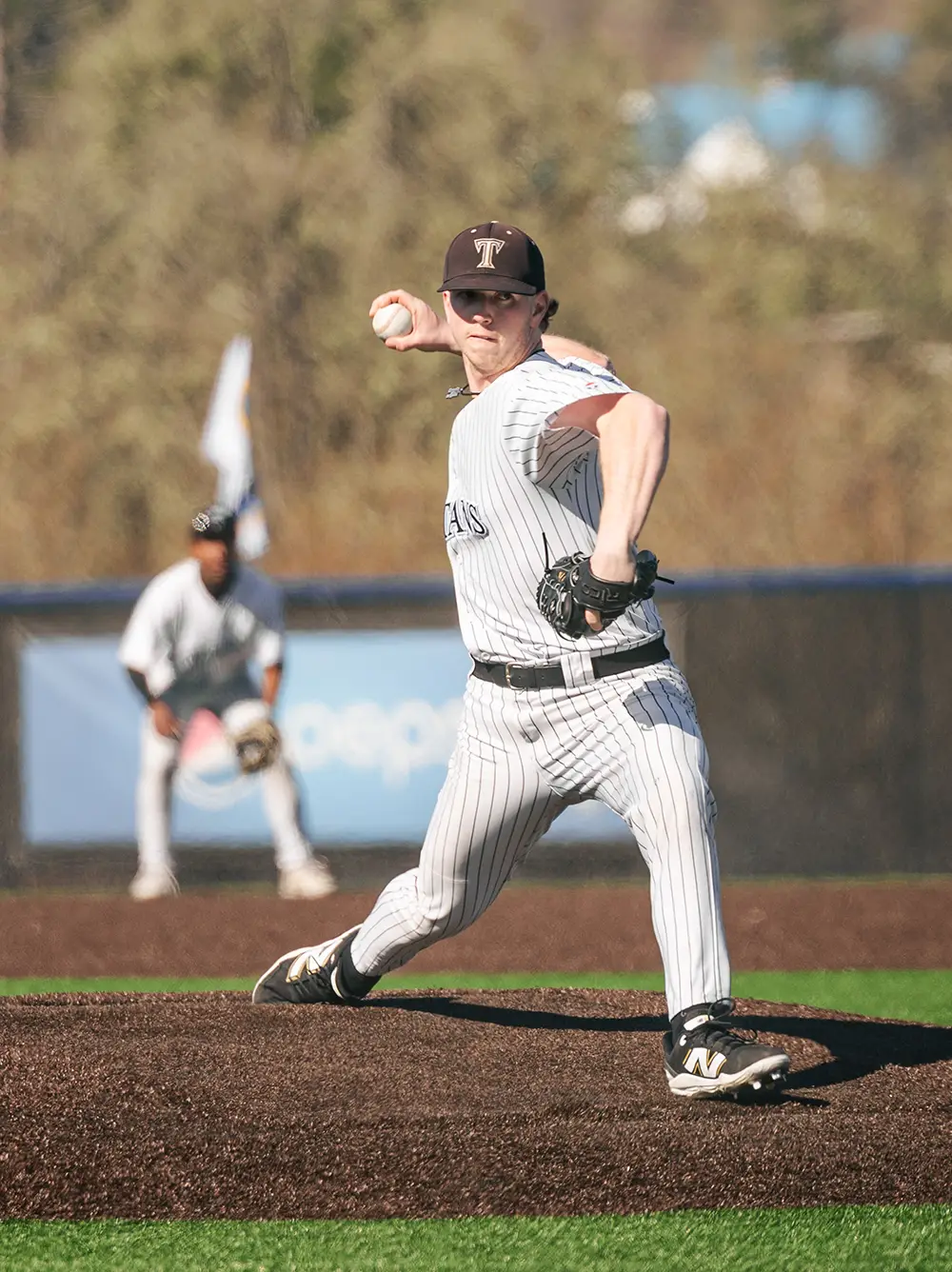 Sam Wilson loaded and driving toward the plate