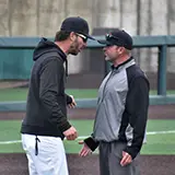 Sam Wilson with Olympus High School head coach Corland Felts