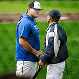 Sam Wilson with Lane Community College pitching coach Jackson Bolander